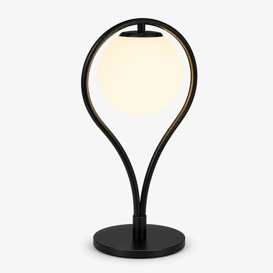 Lampe de bureau à anneau en métal noir mat et globe en verre opalin, modèle Halos, sur fond clair